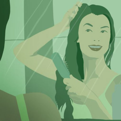 a woman checking her hair hair infron of a mirror