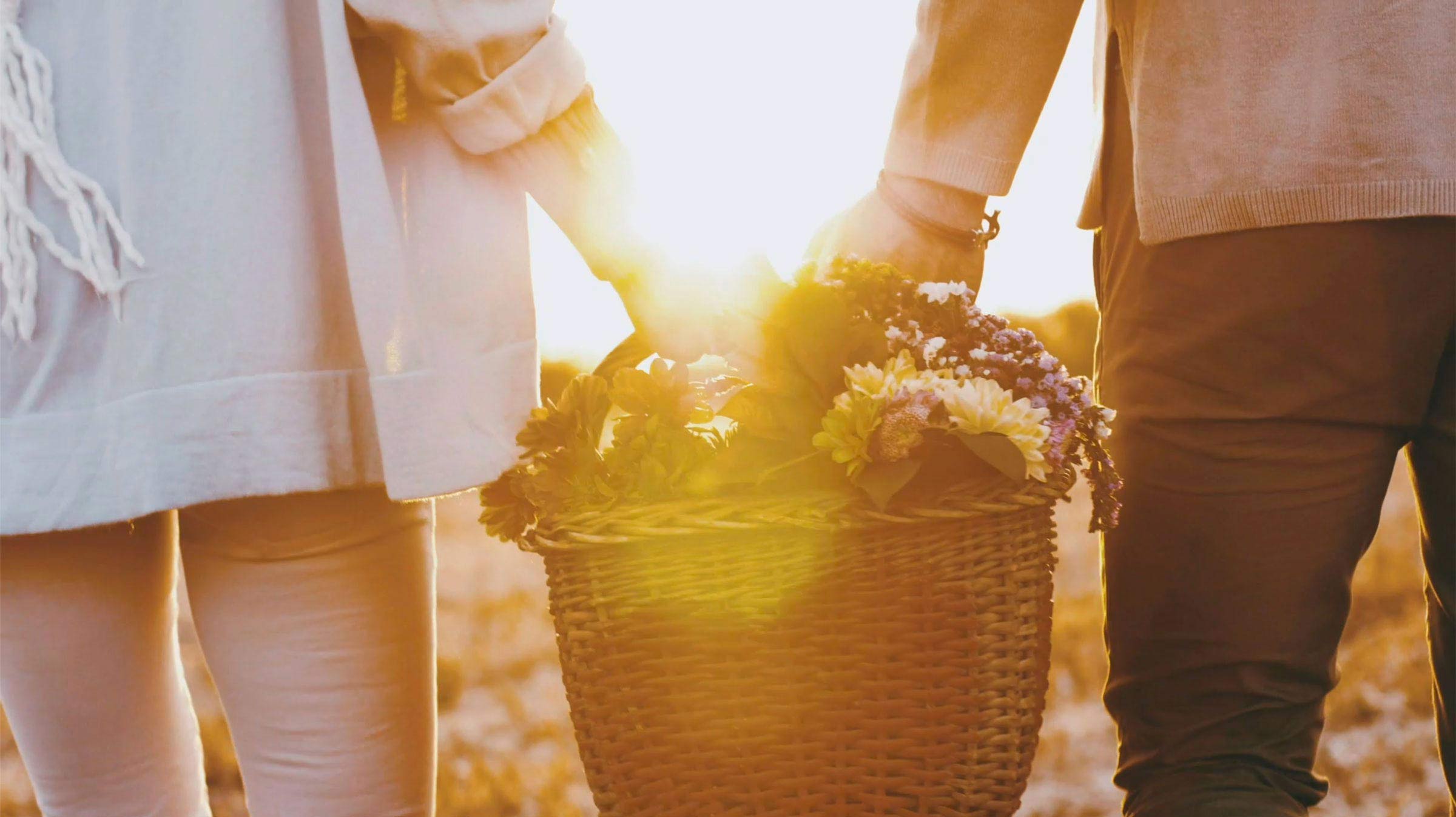 Couple hold flowers